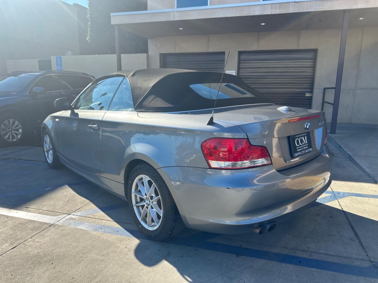 2011 Gray /Black BMW 1-Series 128i Convertible (WBAUN1C52BV) with an 3.0L L6 DOHC 24V engine, Automatic transmission, located at 30 S. Berkeley Avenue, Pasadena, CA, 91107, (626) 248-7567, 34.145447, -118.109398 - Low Miles!!! Elevate your driving experience with our 2011 BMW 1-Series 128i Convertible, now featured at our Buy Here Pay Here (BHPH) dealership in Pasadena, CA. Ideal for enthusiasts in Altadena CA, Glendale CA, Los Angeles CA, and throughout LA County, this stunning pre-owned convertible combine - Photo#2